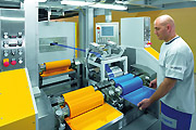 Shuttle reverse roll coater. A new color is prepared during production.